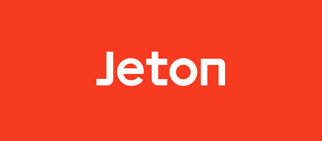 Jeton, logó, piros háttér, fehér betűk, digitális pénztárca, online fizetés, JetonPay, egyszerű dizájn, fizetési szolgáltató