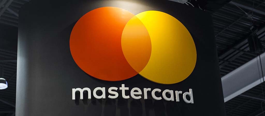 Mastercard logó, narancs és sárga körök, bankkártya márka, fizetési rendszer, pénzügyi szolgáltatás, globális tranzakciók