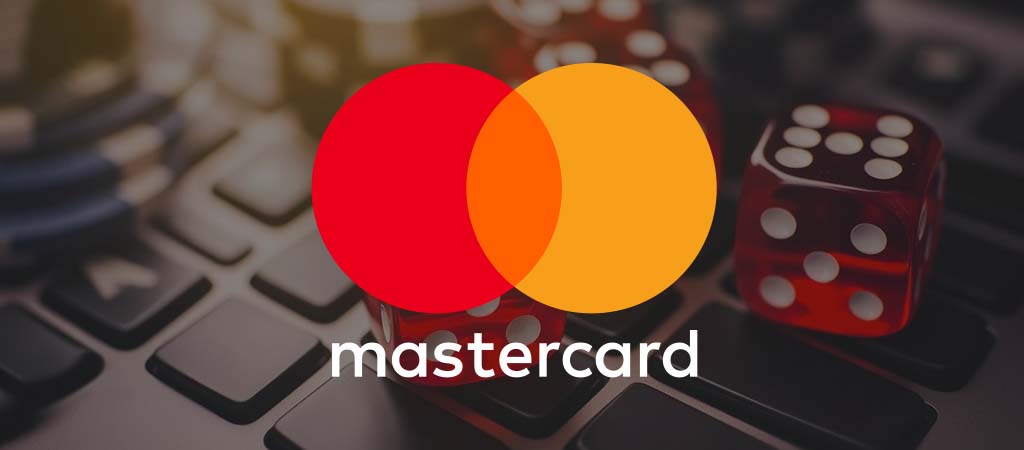 Mastercard logó, piros és narancs körök, kockák, billentyűzet, online kaszinó, digitális fizetés, szerencsejáték, tranzakció
